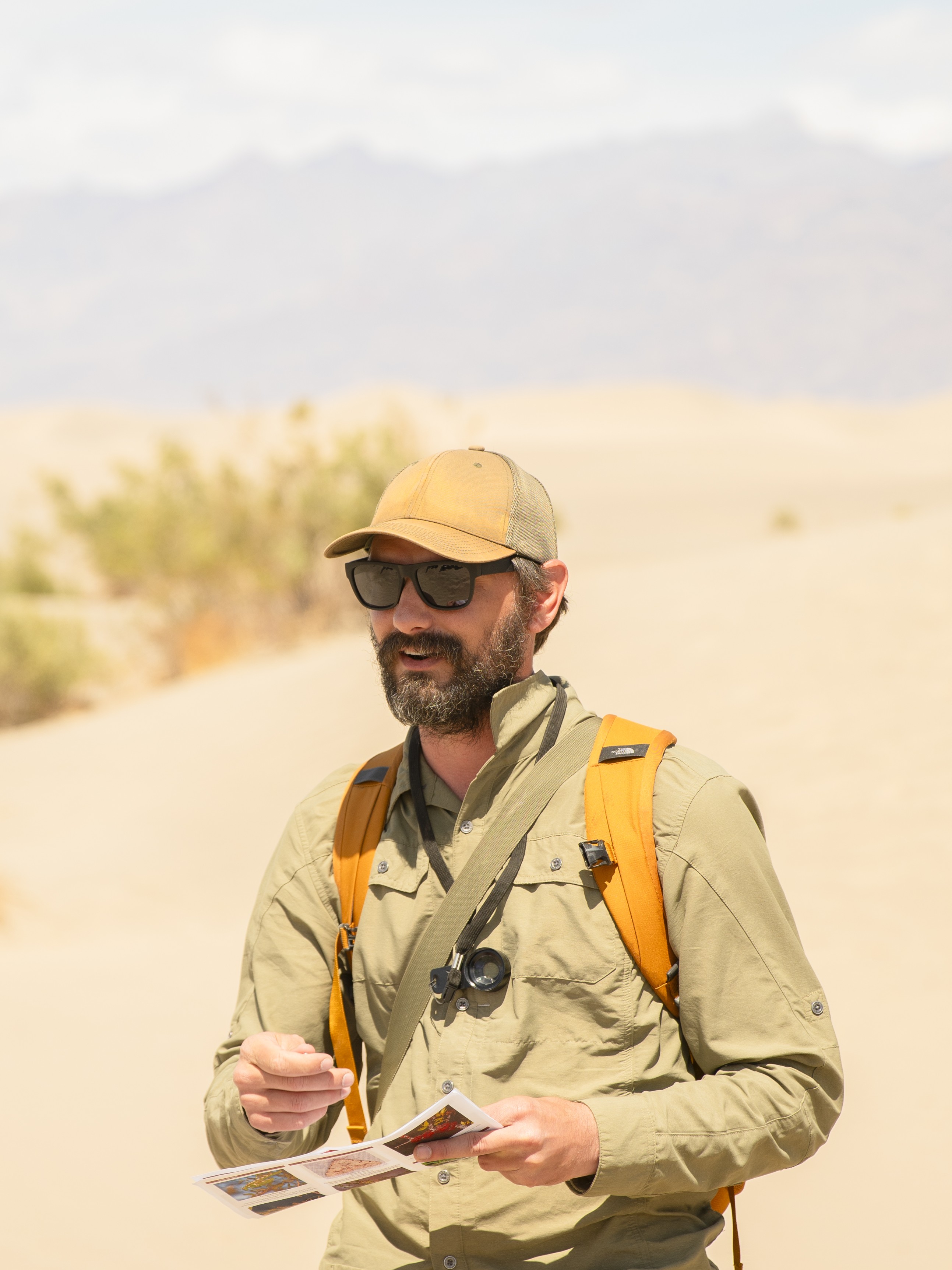 August Frisk presenting on the insect ecology of Larrea tridentata.